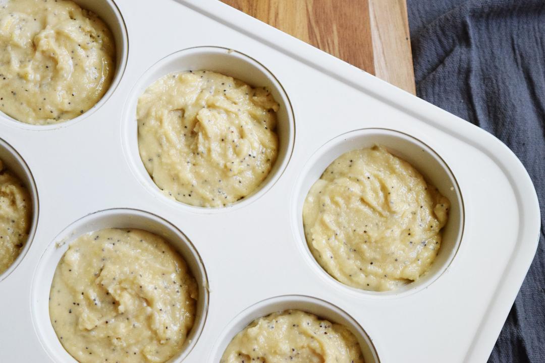 unbaked lemon poppyseed muffins in pan